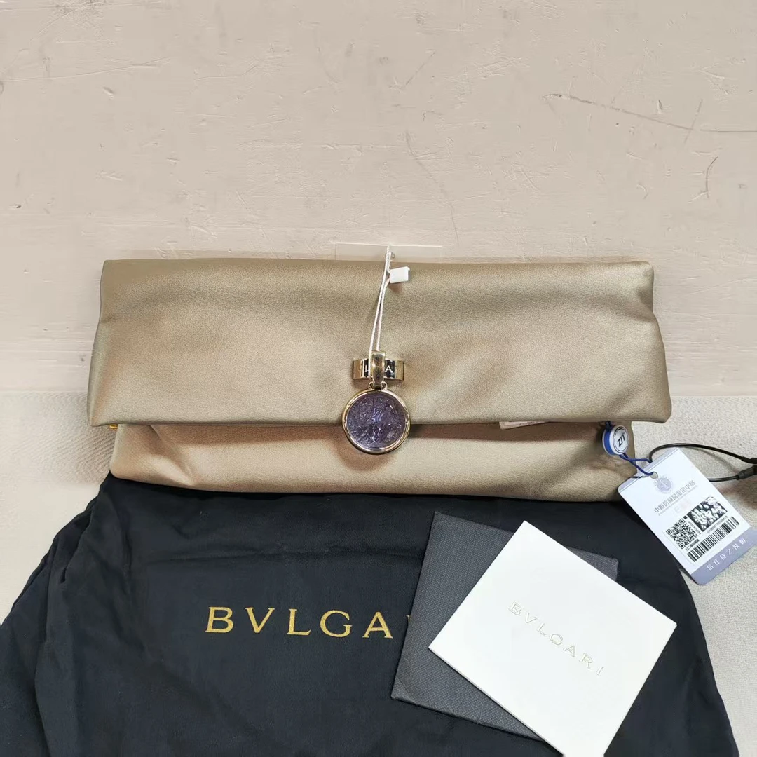 95新 BVLGARI/宝格丽 06-07卡其色缎面女士手拿包992105120308