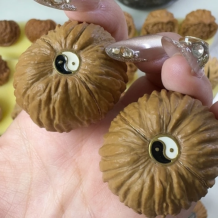 张***丶文玩核桃猴头元宝（镶嵌有修介意勿拍）