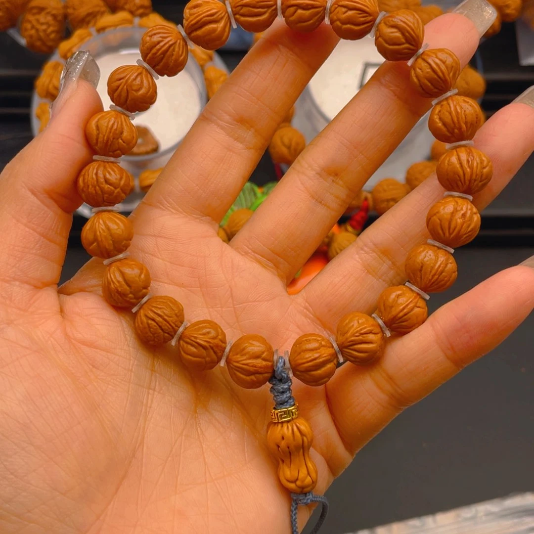 桃核手串三***?见健健康康平平安安5