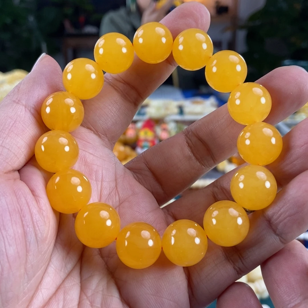 琥珀未镶嵌珠宝奇石15鸡油红同料串微瑕28.87