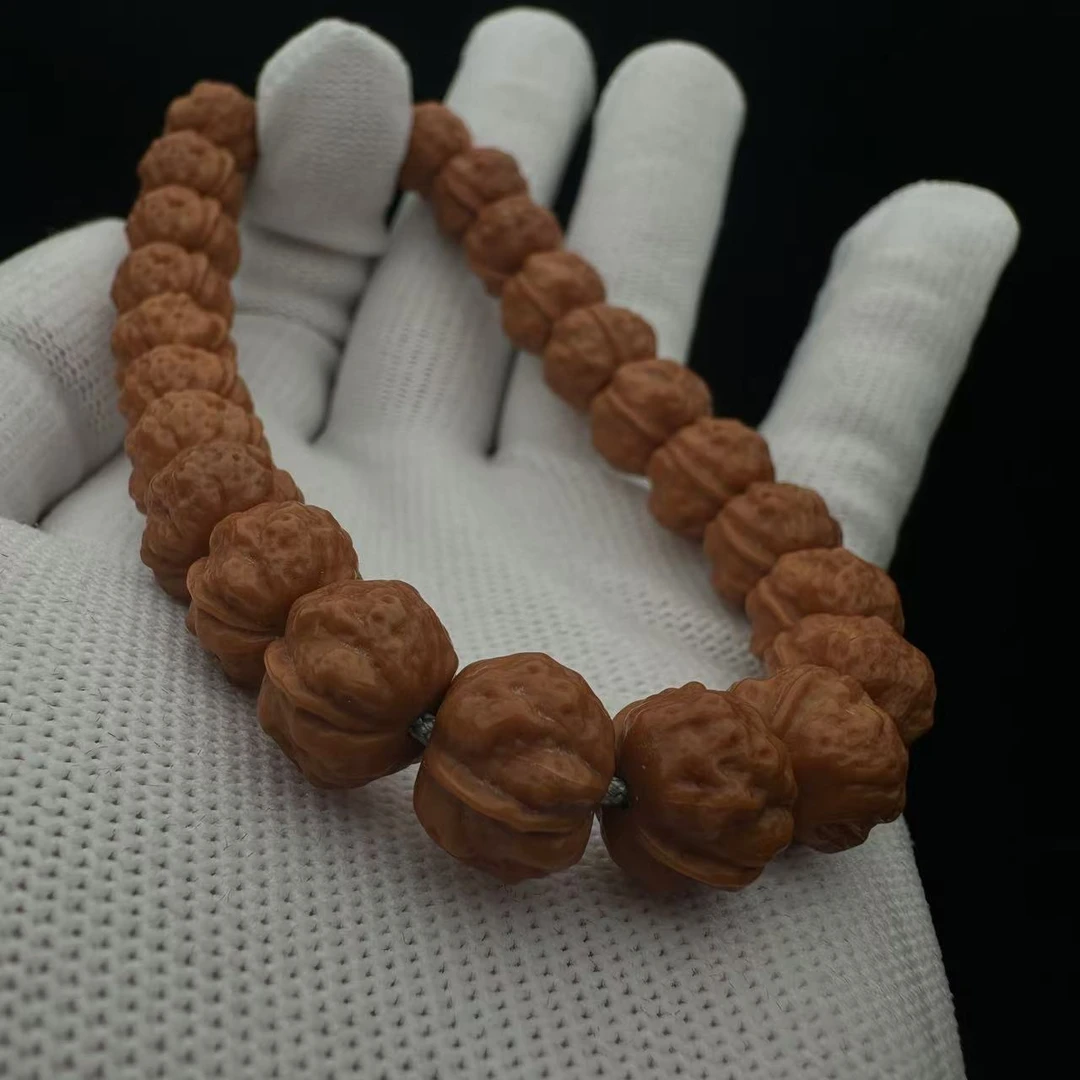 猴头雕刻蟾宗手持手串