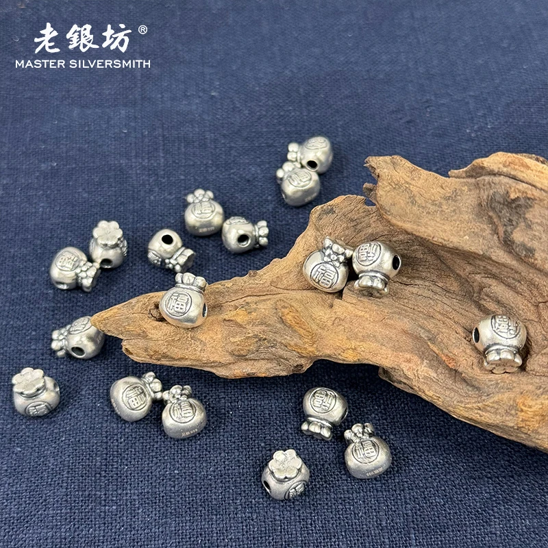 足银银制品 老银坊 足银999 2个*福袋路路通 890230