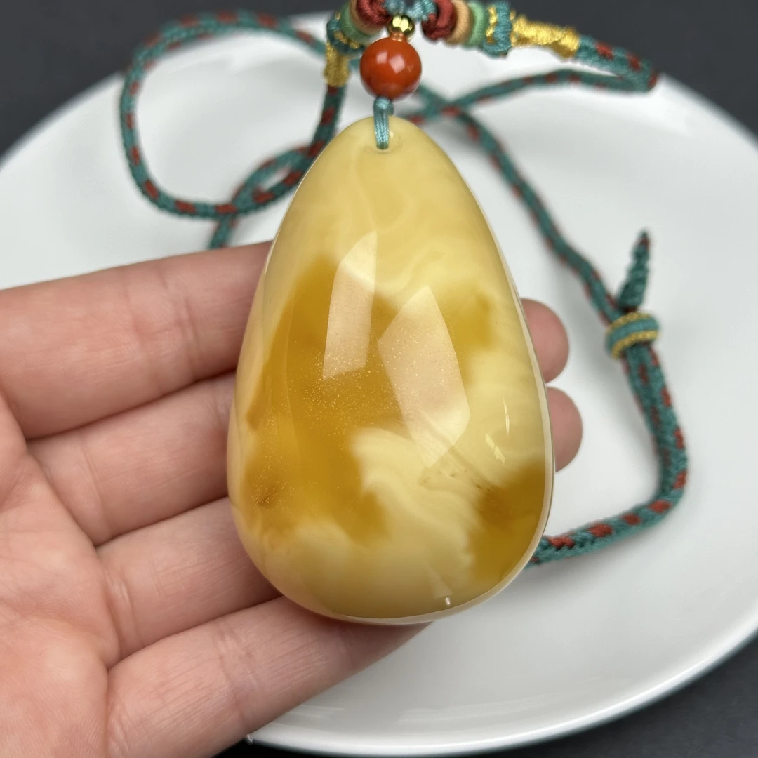 Y2153天然原矿蜜蜡 吊坠41.2×64.6×26.7mm支持鉴定 假一罚四