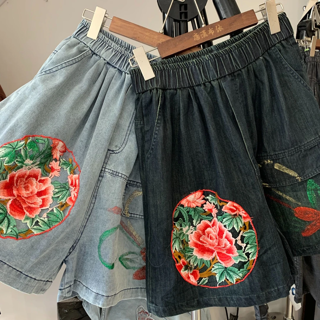 圆形大花牛仔短裤唐汉布衣新款G