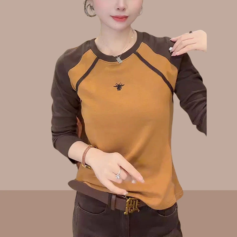 橘色圆领设计感圆领显瘦长袖2025秋冬新款舒适时尚正肩打底衫上衣