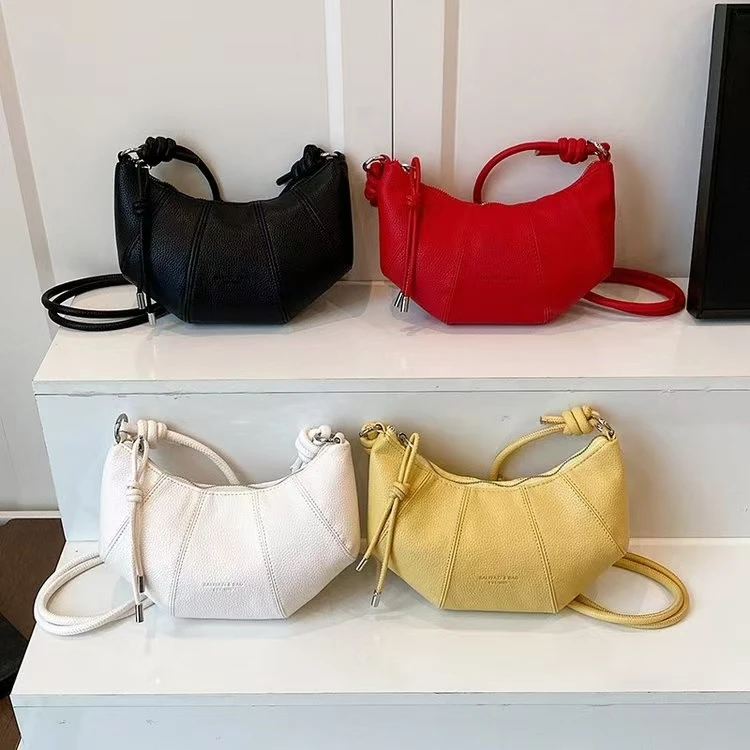 春夏季多巴胺牛角包女2025新款时尚洋气饺子包通勤百搭单肩斜挎包