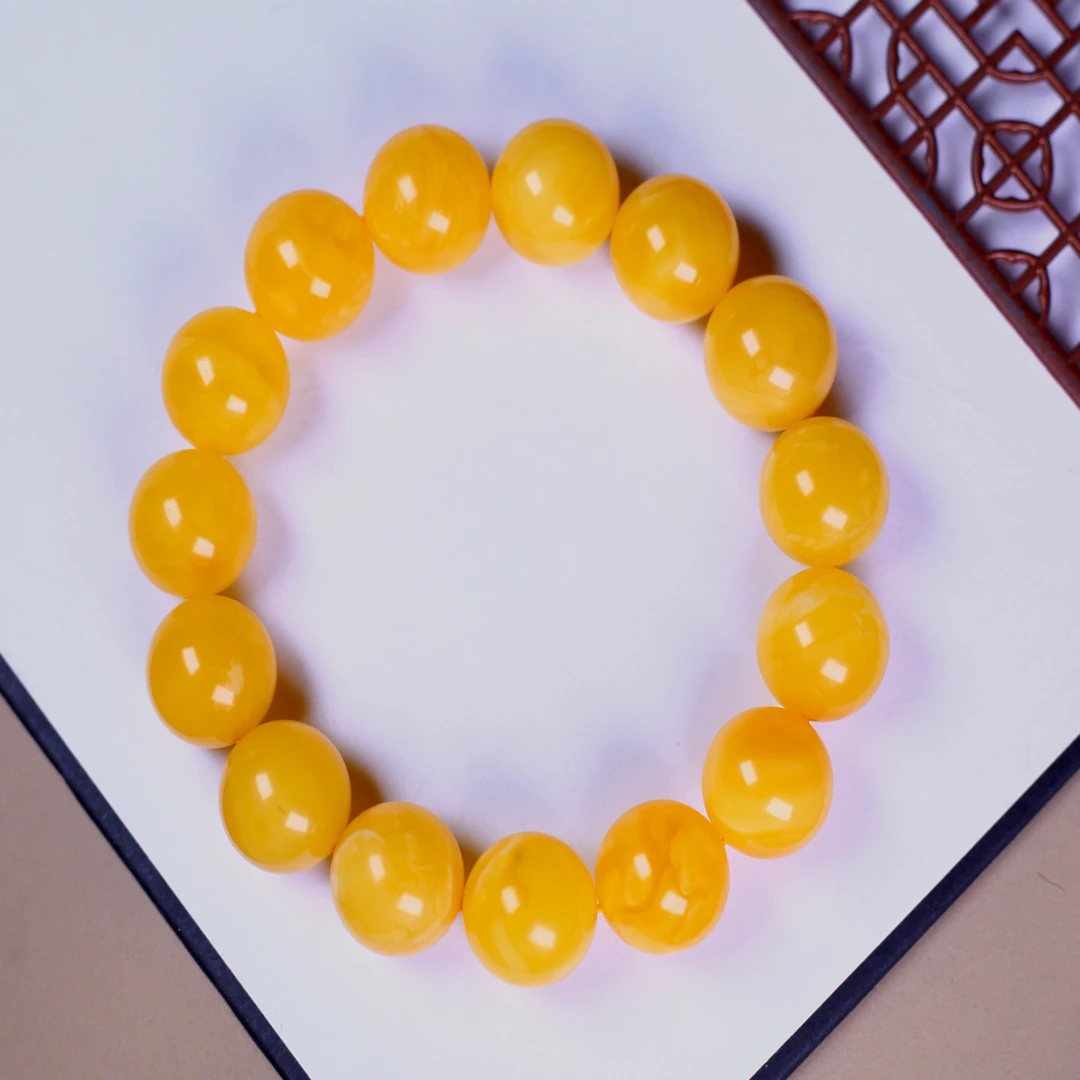 16+焦皮料圆珠蜜蜡手串