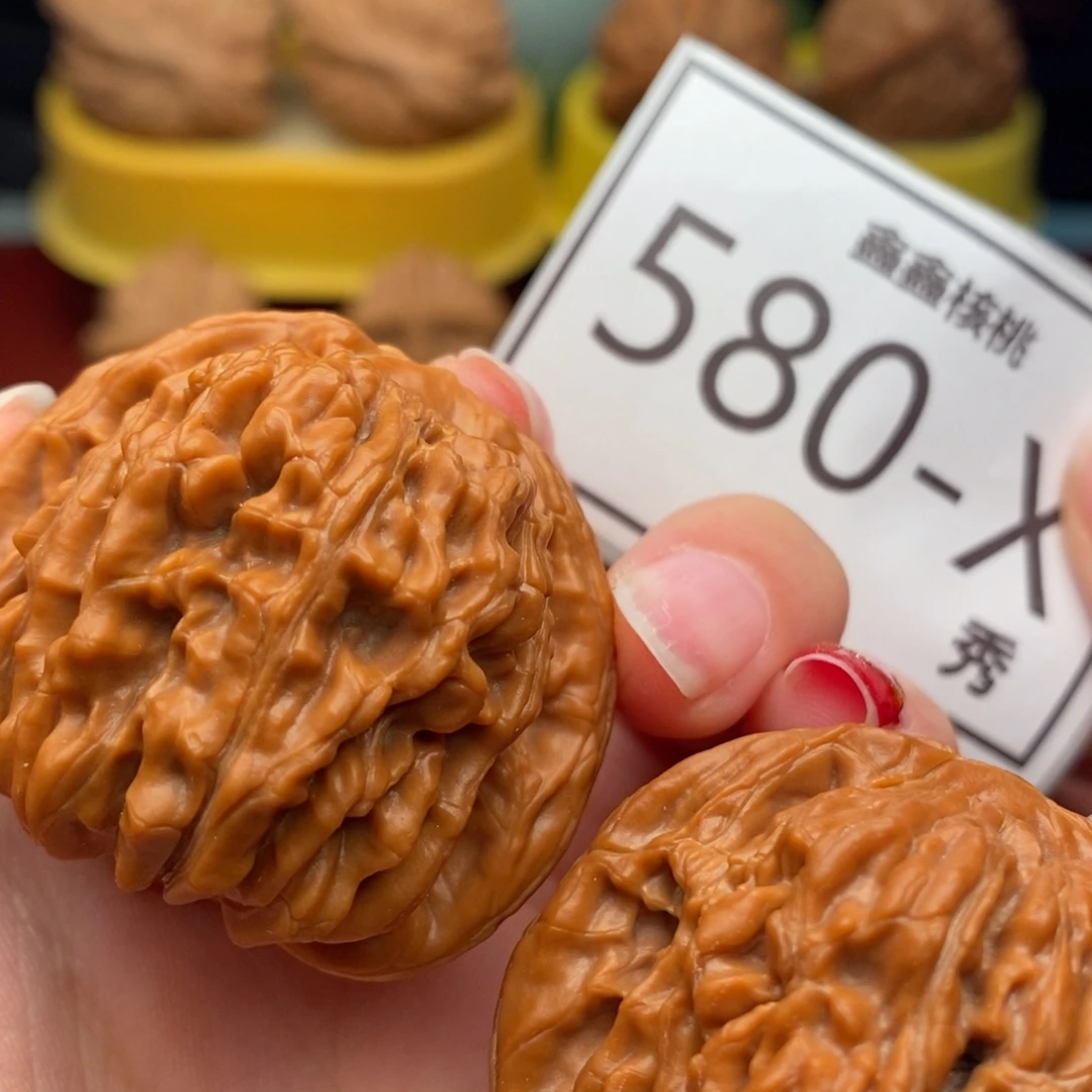 桃核把件汗高楼42……