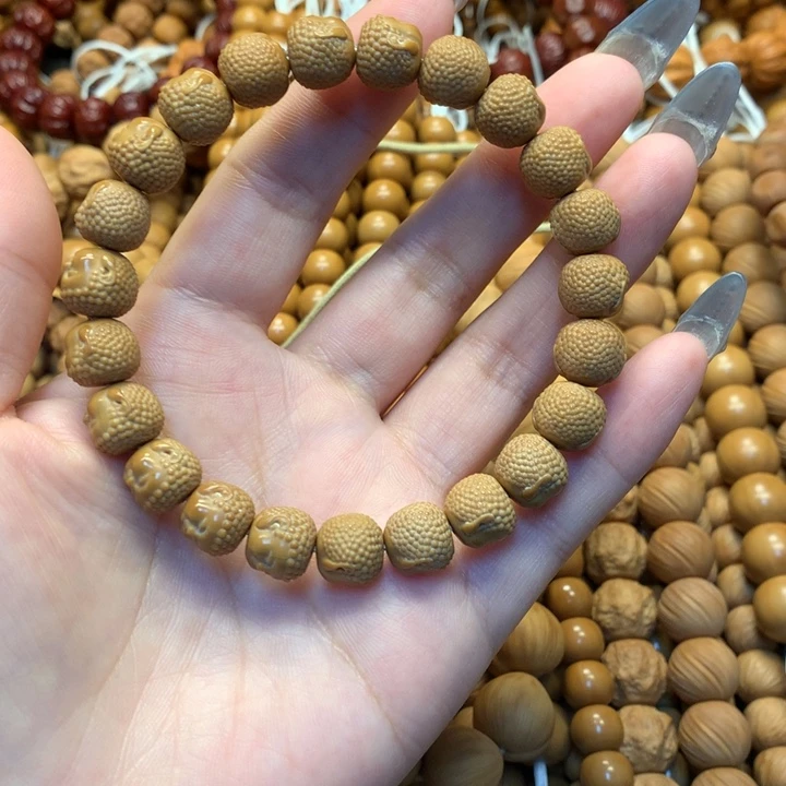 滚***点猴头核桃手串微瑕宝宝佛