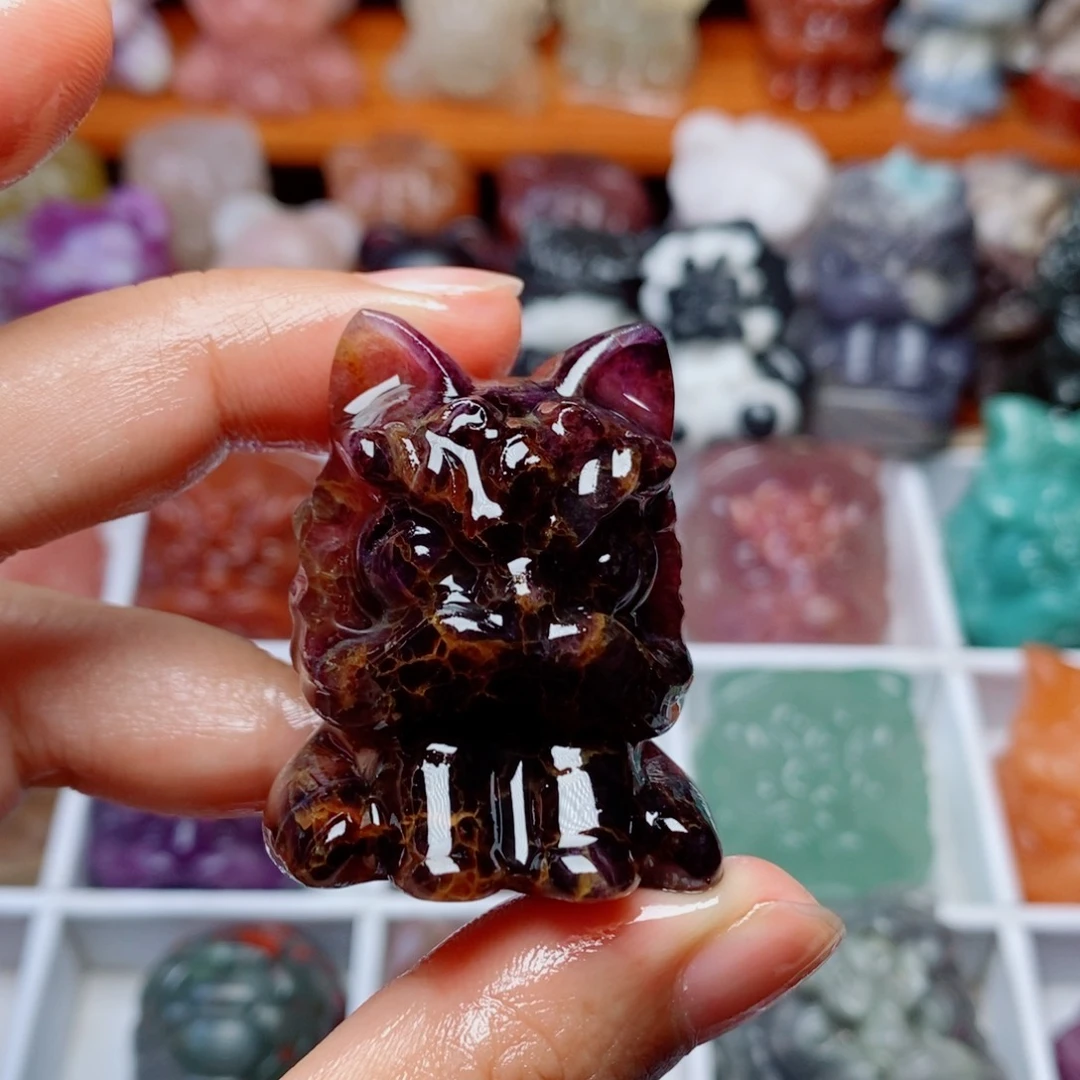 紫黄萤石猫狮手把件