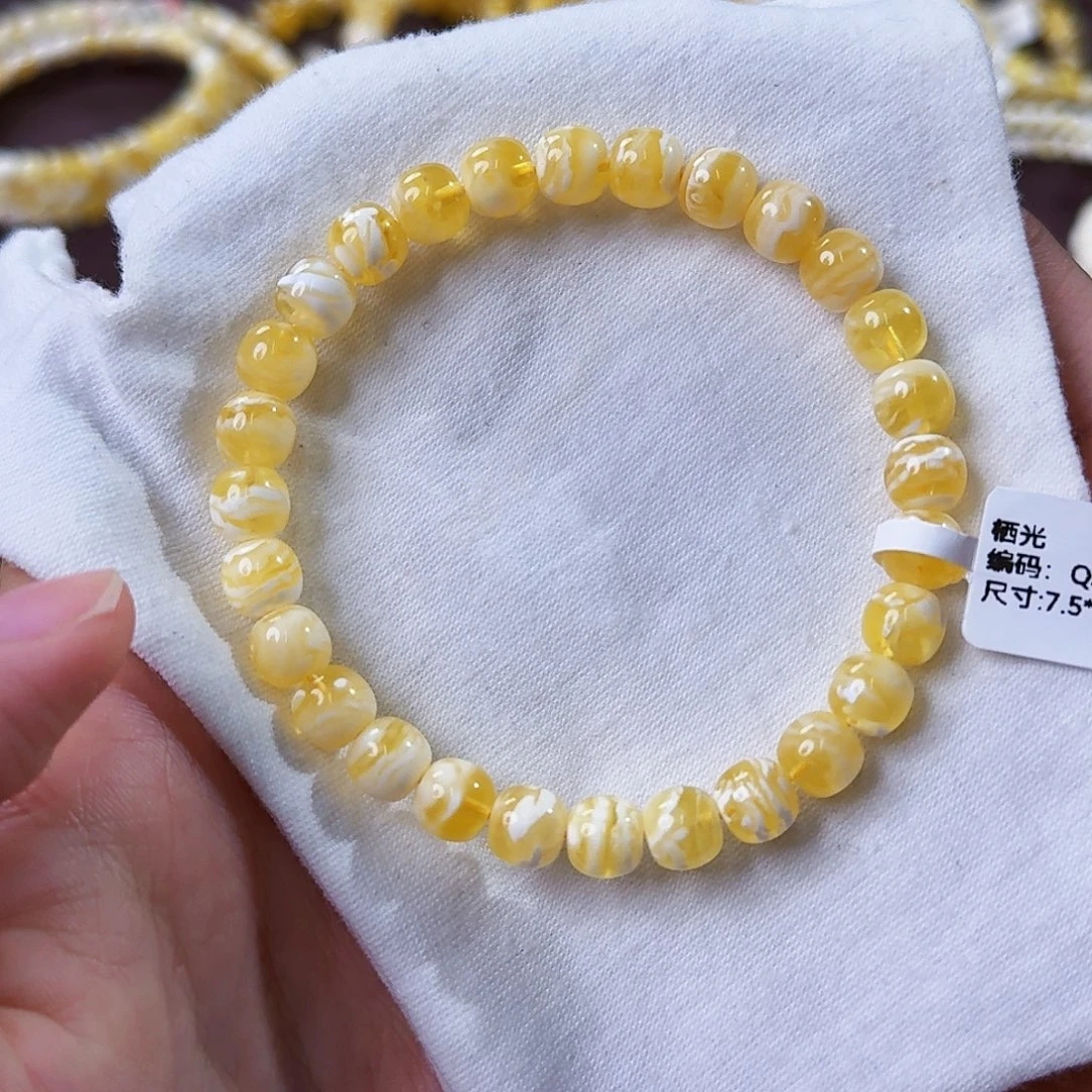 琥珀未镶嵌裸石7.5mm金瓷白虎皮