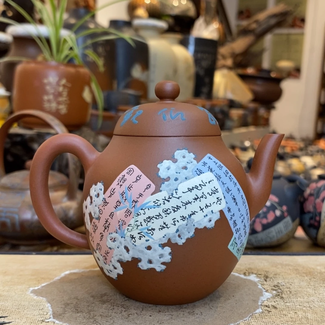 陈***弟云南建水紫陶彩填壶