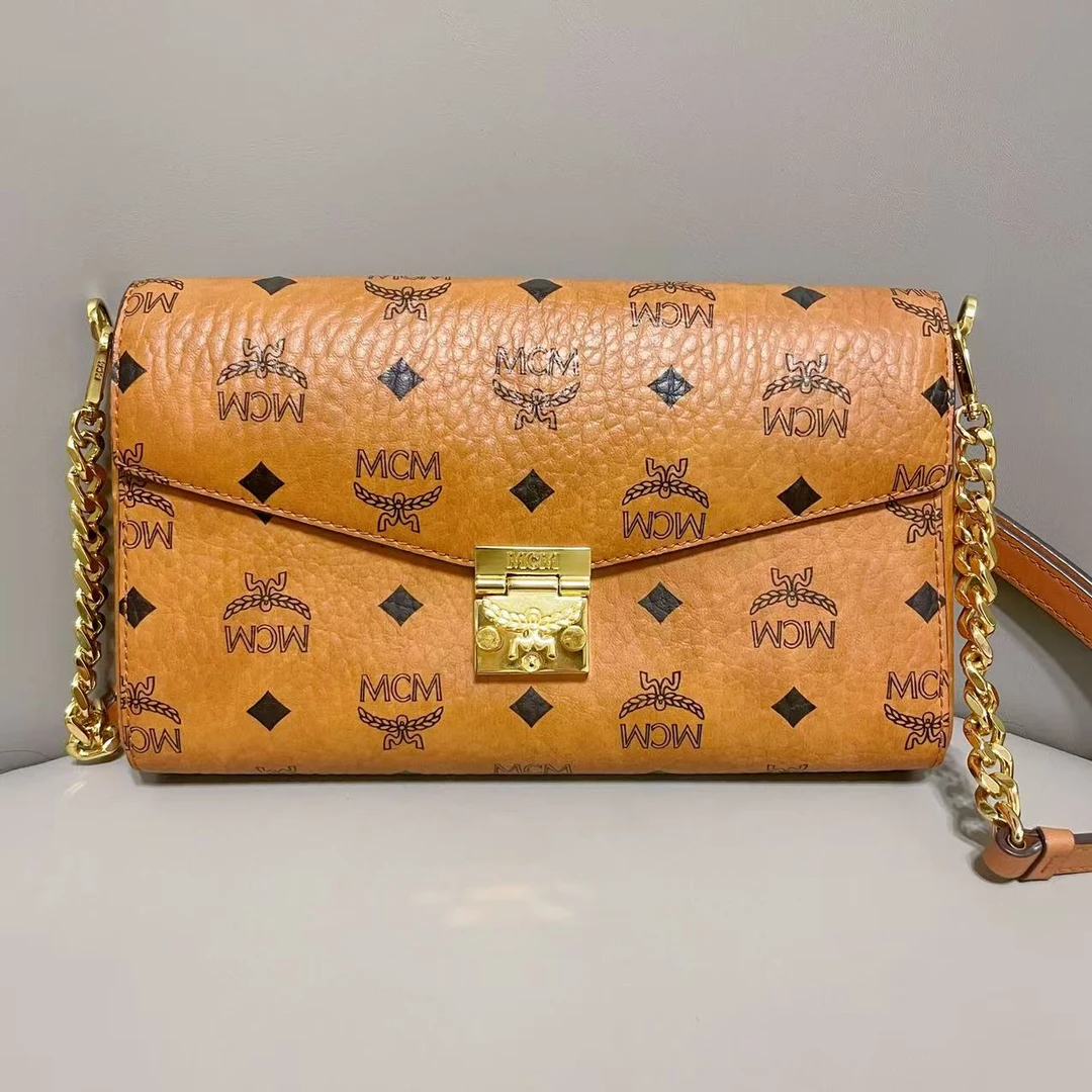 99新 MCM 新款中号信封 斜挎包