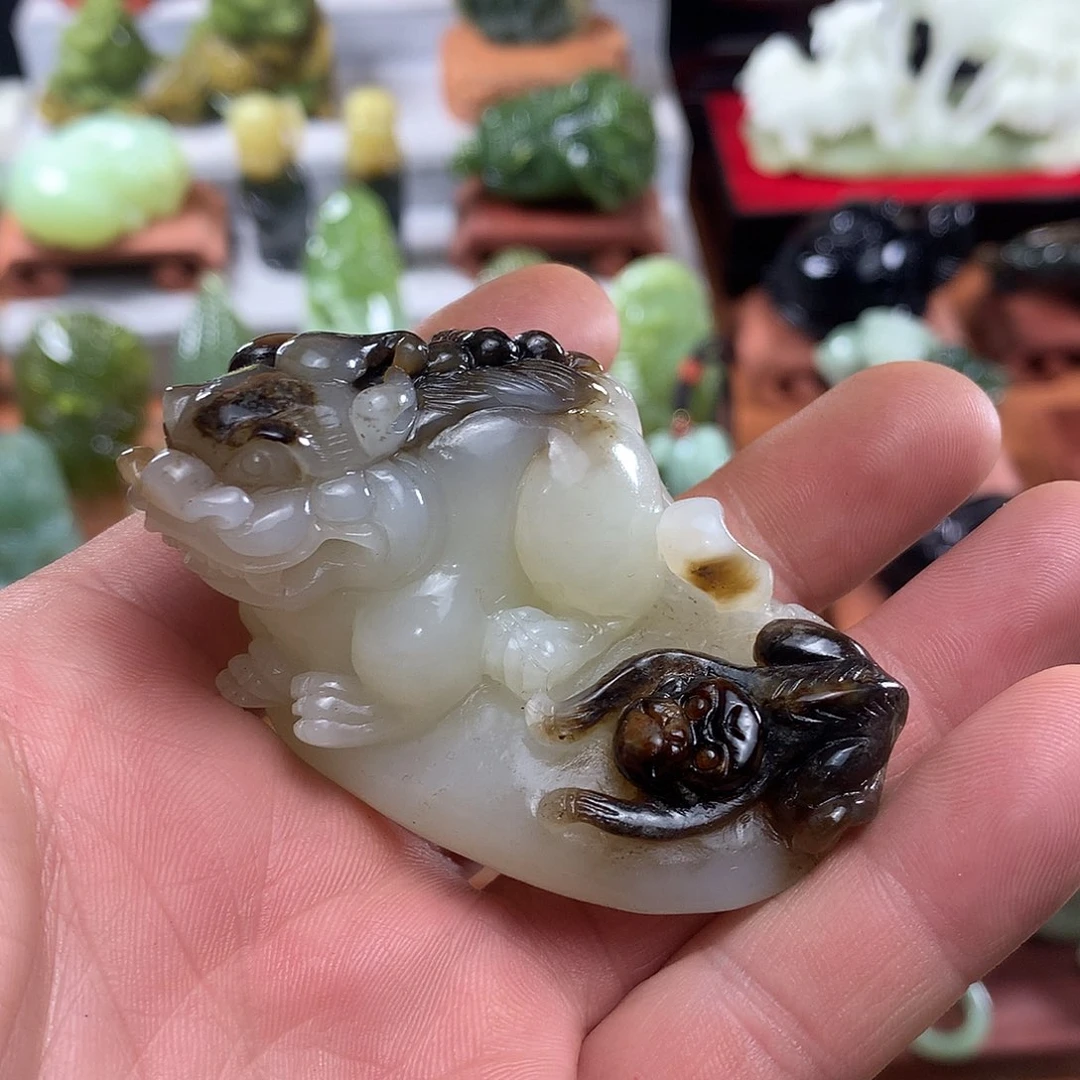 和田玉手把件未镶嵌