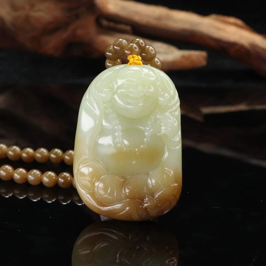17和田玉且末糖佛公吊坠/900250北京中保拍卖