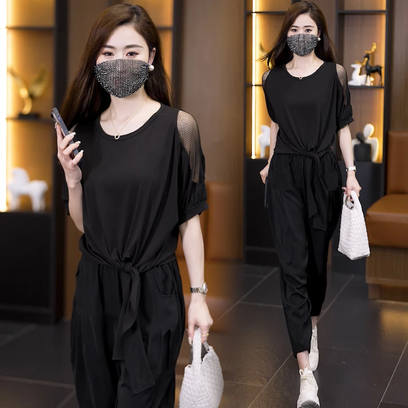 休闲套装2025夏新款时尚简约纯色肩膀镂空系带圆领短袖裤子两件套