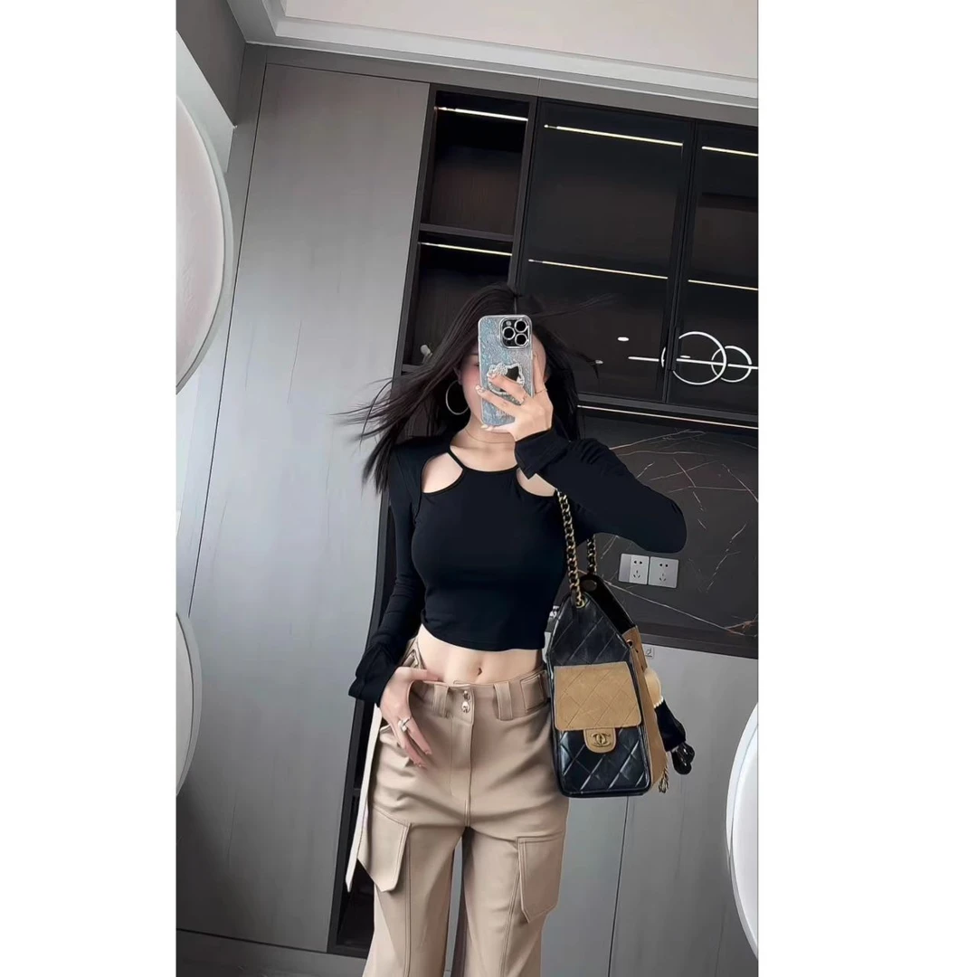 曼曼【美丽规律~】韩版辣妹不规则上衣显瘦弹力长袖T恤