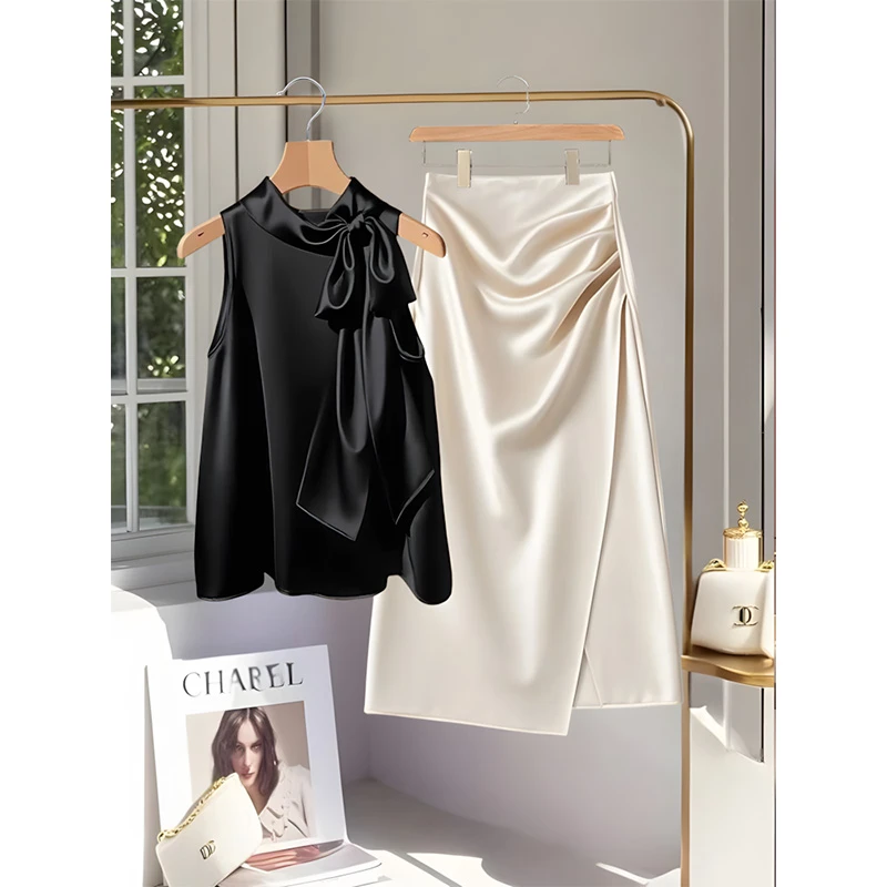 法式纯欲慵懒风女装黑色挂脖蝴蝶结小衫夏季设计感半身裙两件套装