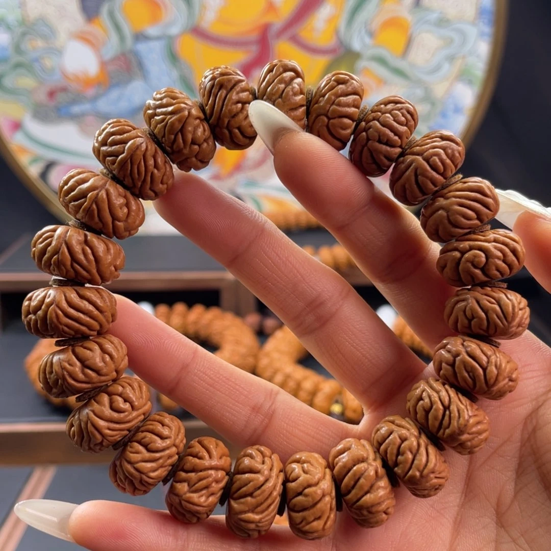 桃核手串18尺寸祥云飞碟