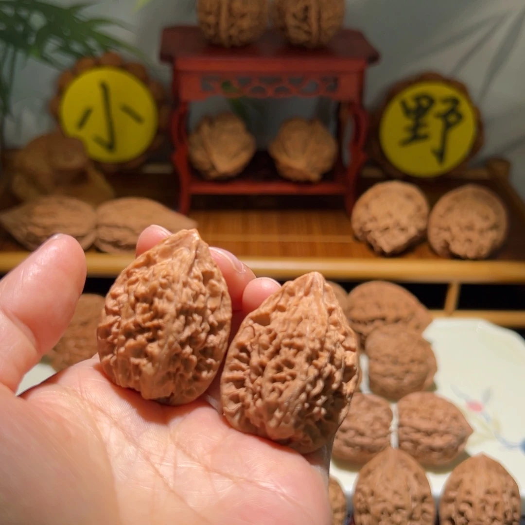 梵****文玩核桃把件火凤鸡心