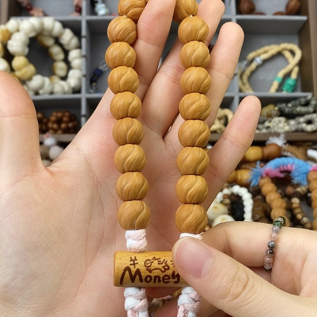 白玉菩提吊坠猴头扭扭手持