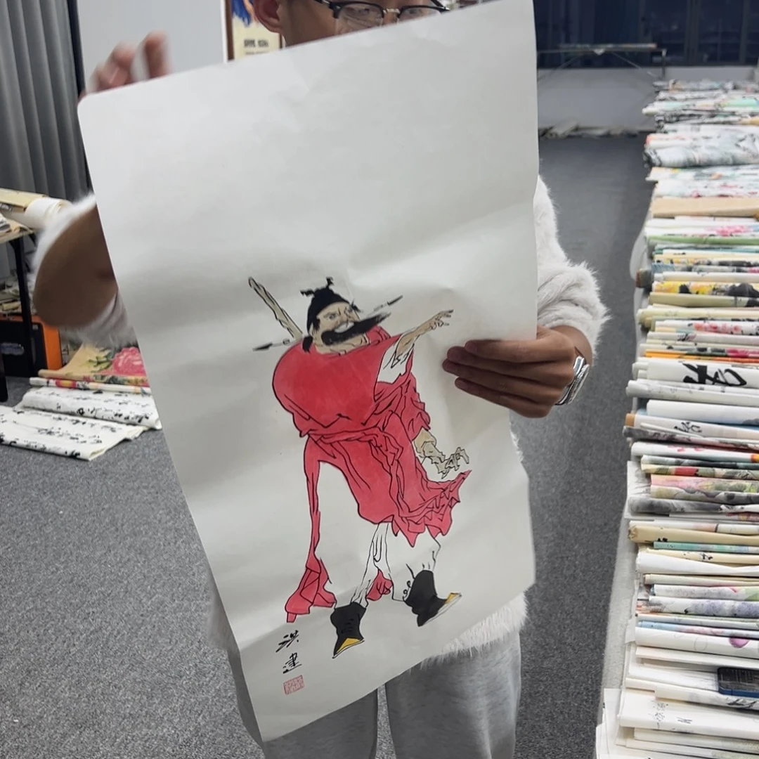 国画卖字画的小男孩