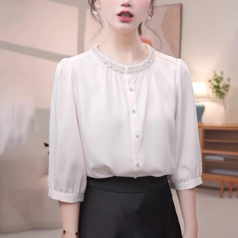 白色圆领衬衫女2025夏季新款时尚显瘦洋气高级感重工钉珠休闲上衣