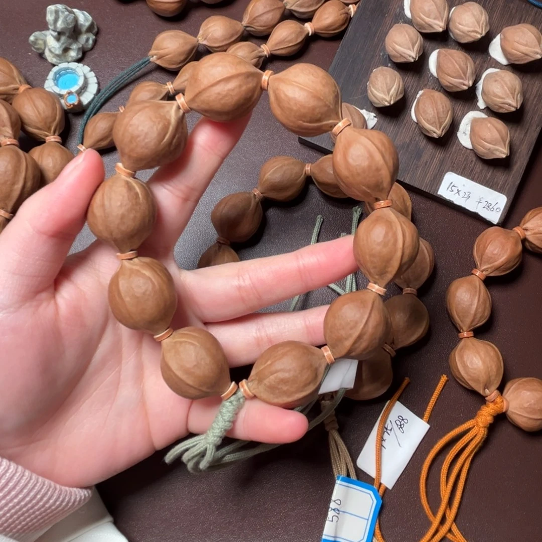 郝***食手串/手链橄榄核2026梅林铁三花橄榄核