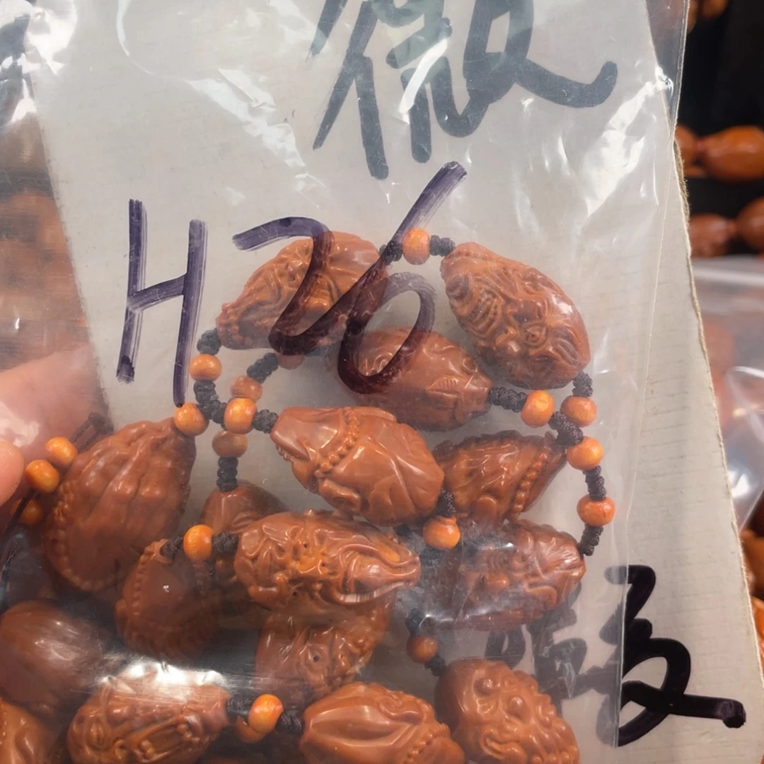 橄榄核其他橄榄核雕工艺手串 瑕疵介意勿拍