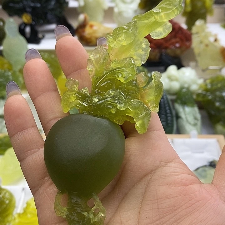 迷***哥未镶嵌蛇纹石玉手把件