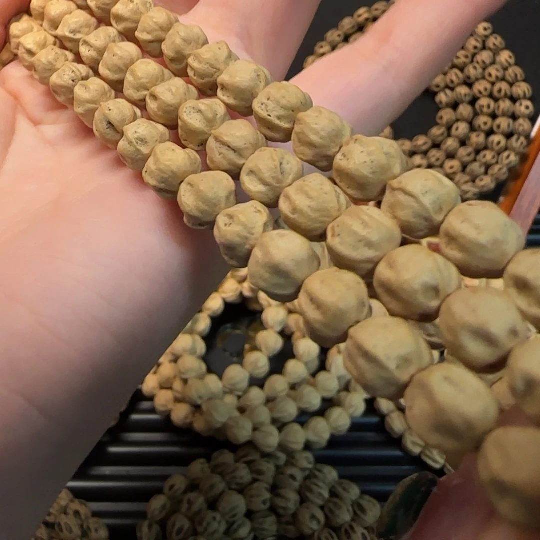 墨***术柏香籽/百香籽吊坠