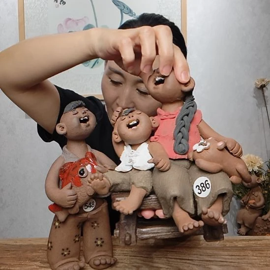 *****不规则紫砂羲媧娃系列作品大小娃组合