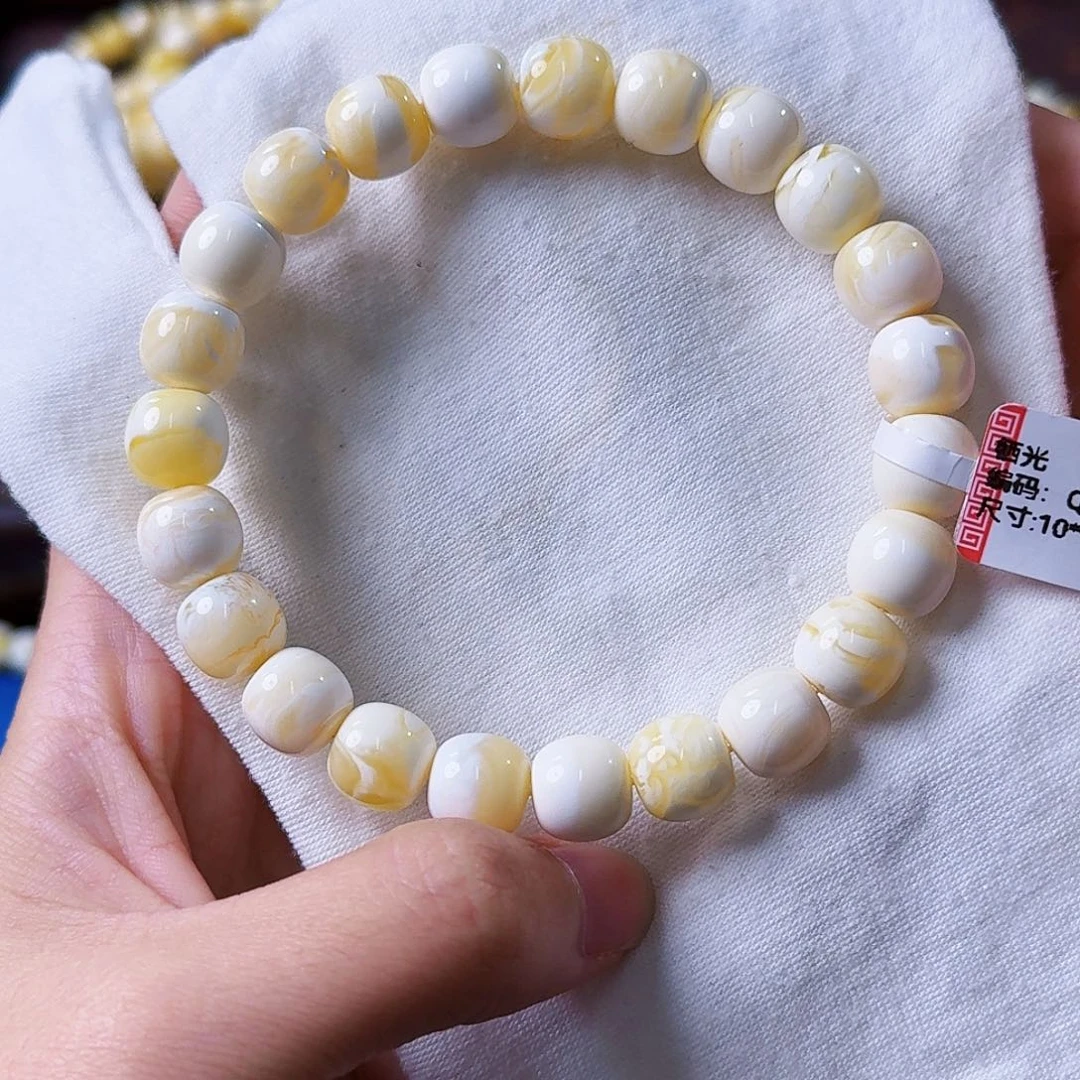 琥珀未镶嵌裸石10mm瓷白溶洞妖花