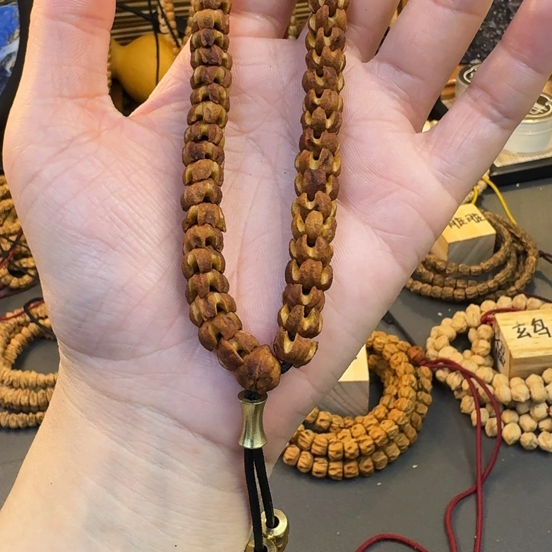 柏香籽/百香籽手串李**?