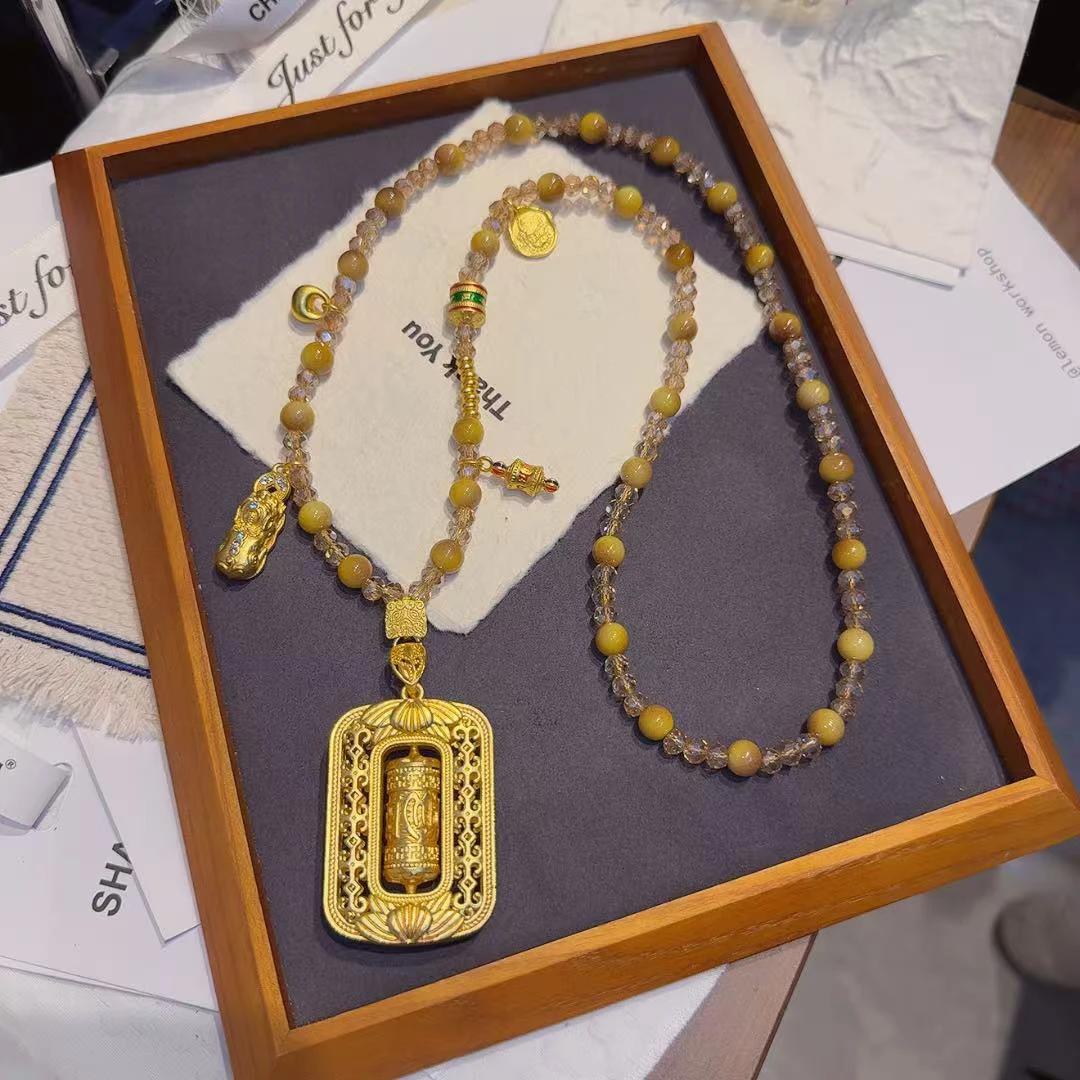 铁合金玻璃项链 国潮轻奢咖色仿猫眼转转桶长项链