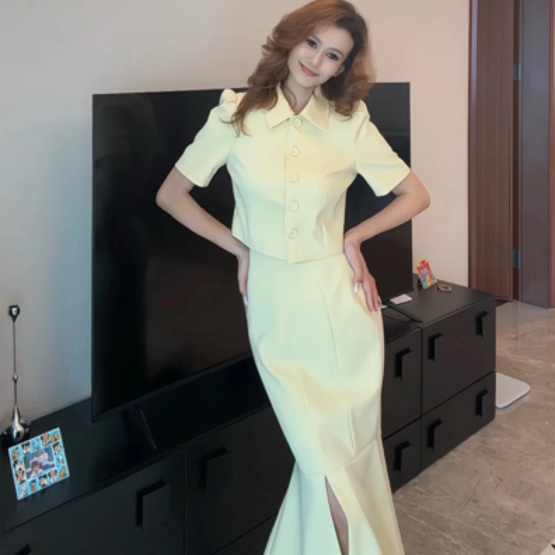 （达）夏季柠檬黄上衣半身裙套装