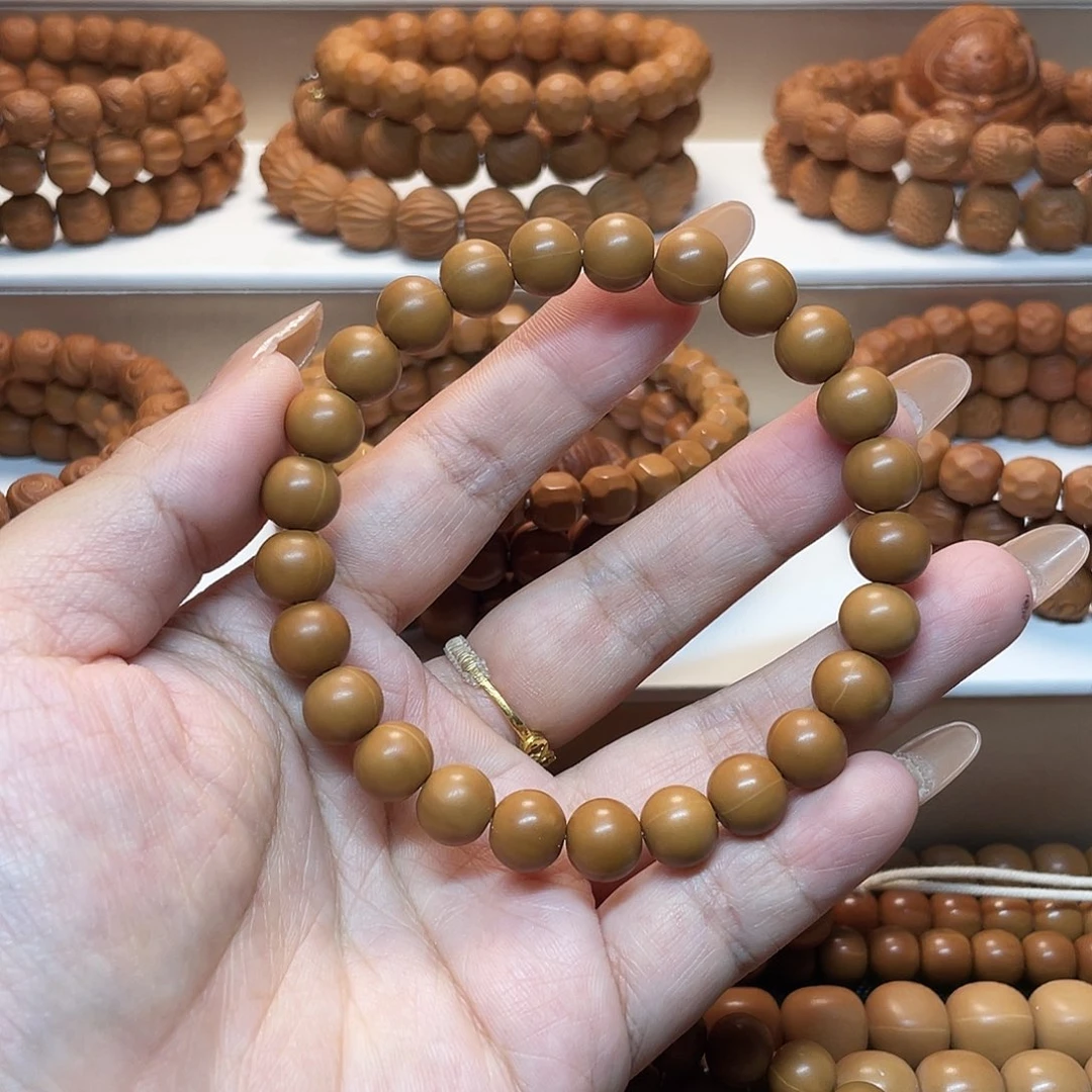 灿***灿核桃手串/手链龙炎正圆光珠9.5