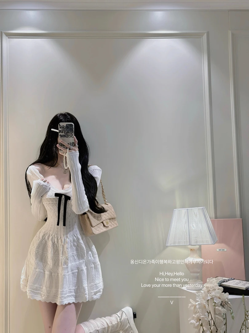 法式纯欲风蝴蝶结长袖连衣裙子女秋季设计感收腰甜美白色针织短裙