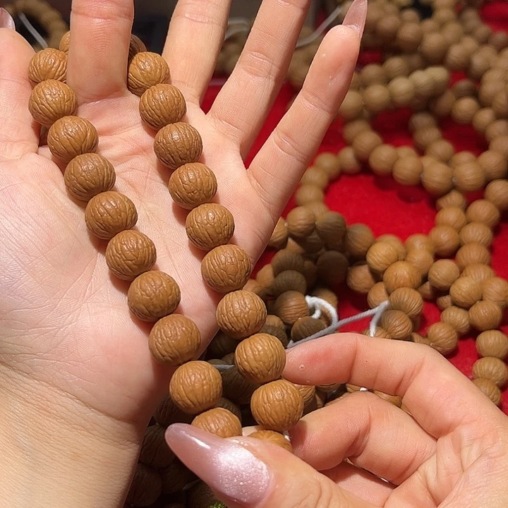 猴头核桃吊坠&***透14同尺凤羽手持全品无瑕无药