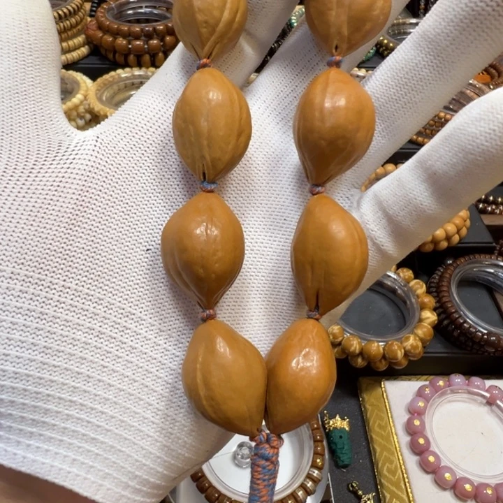 橄榄核吊坠梅林铁盒手持