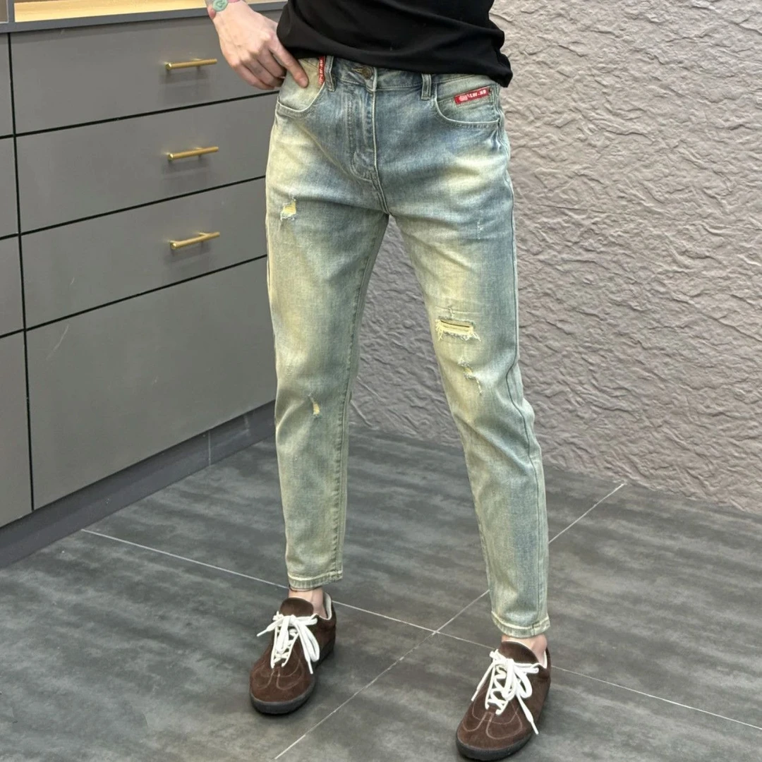 潮牌轻奢夏季破洞牛仔裤新款潮流百搭修身小脚复古休闲男士九分裤