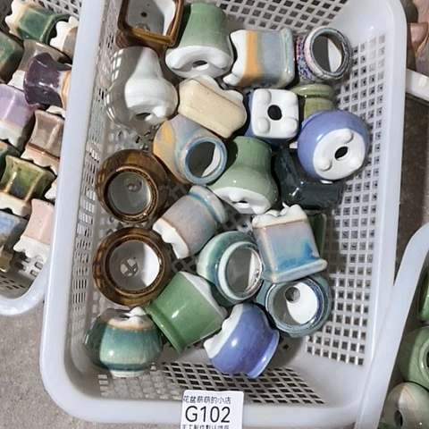 紫砂花盆102瑕疵品口径3厘米。我