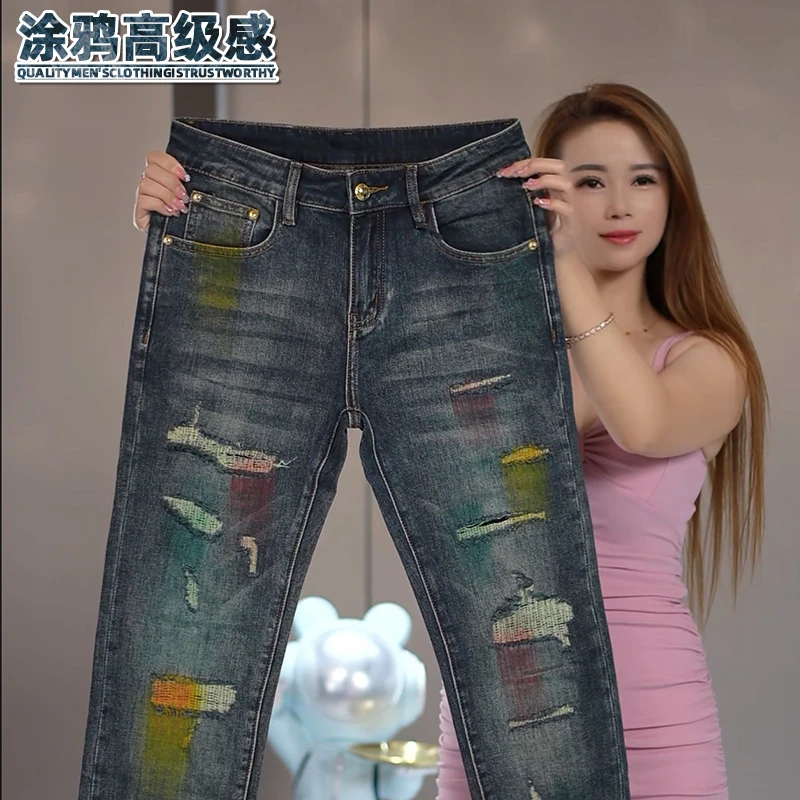 假破洞涂鸦牛仔裤男士秋季新款复古水洗潮流男装修身欧货弹力裤子