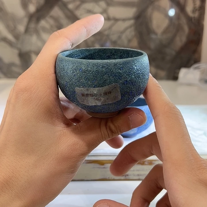 晏如堂犀皮小手握杯