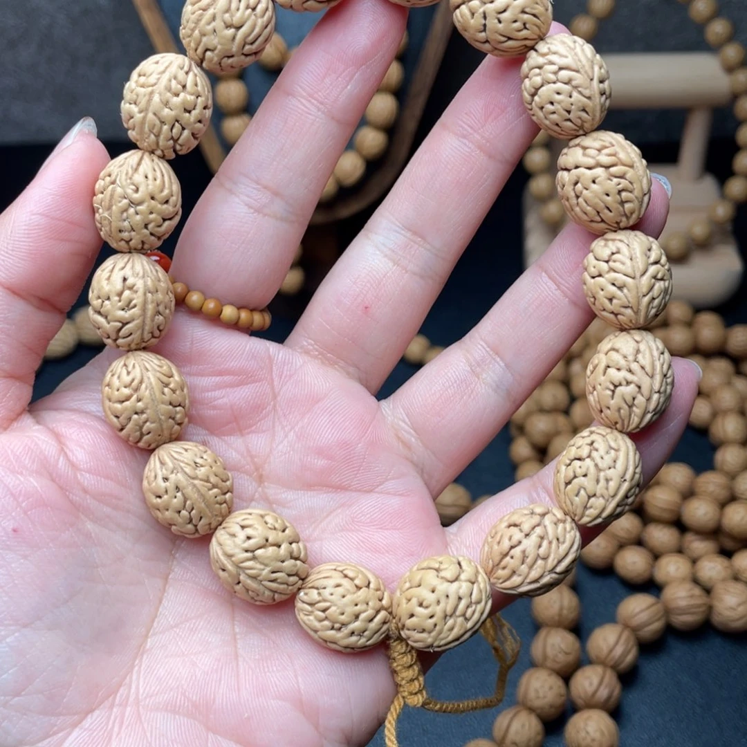 13野生大肠纹钱袋子手持