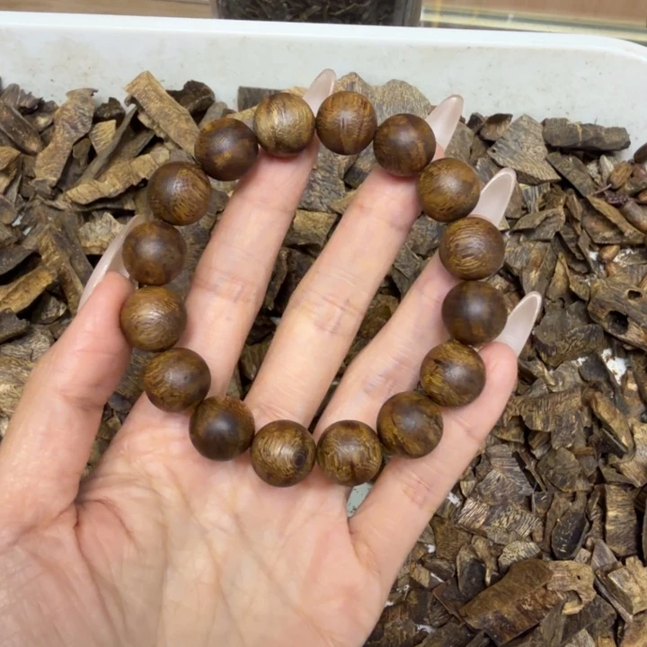 阿***天沉香沉香香囊乌身圆叶沉浮1.3