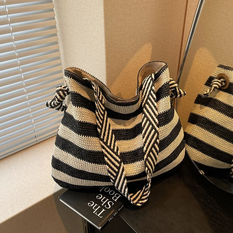 托特包包女2025新款休闲百搭海边度假编织包大容量单肩腋下沙滩包
