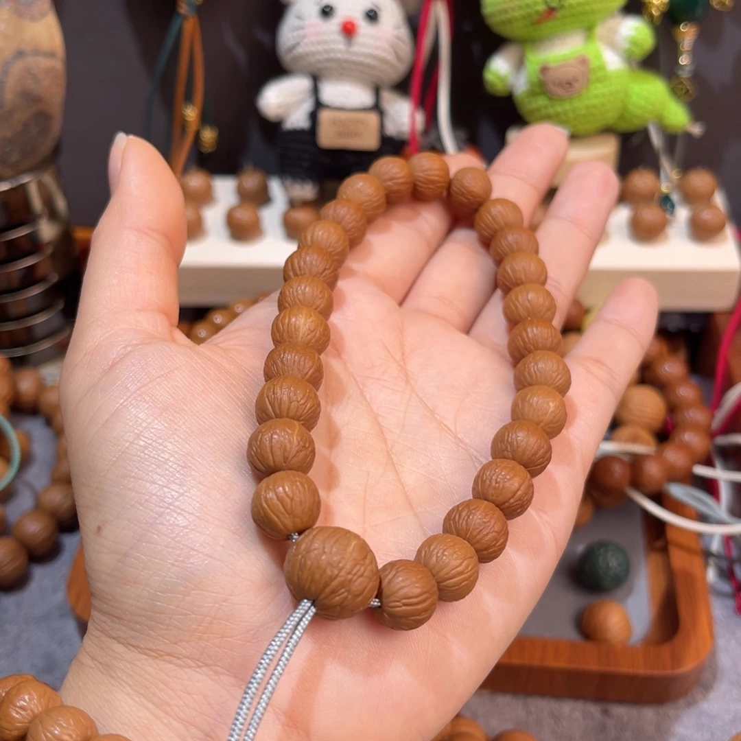 中***号猴头核桃吊坠凤羽