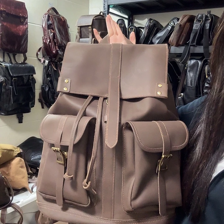 困***兽头层牛皮包包背包