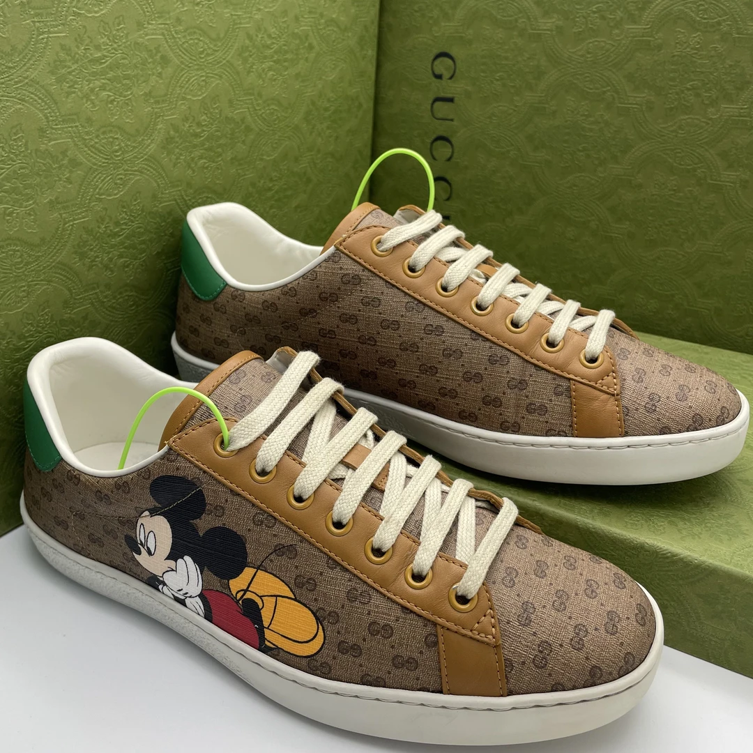 95新 GUCCI/古驰 41.5欧码/棕色皮面双G印花米奇图案休闲时尚板鞋